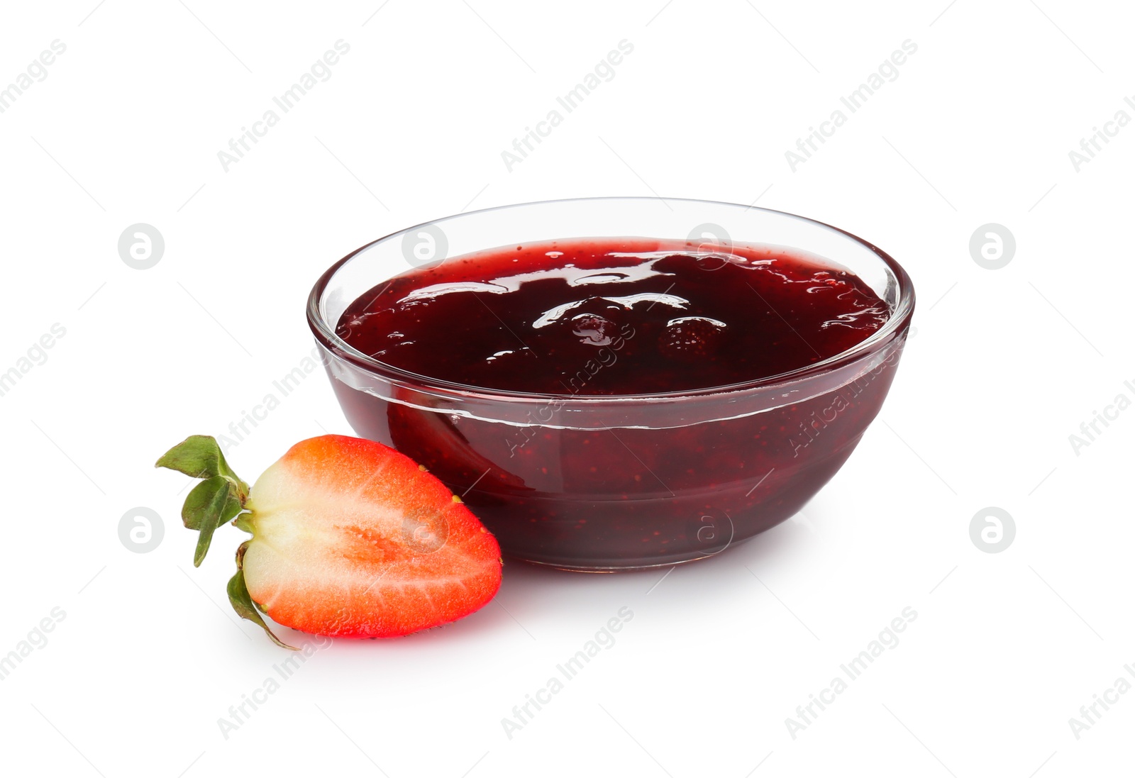 Photo of Tasty strawberry sauce in bowl and fresh berry isolated on white