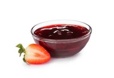 Photo of Tasty strawberry sauce in bowl and fresh berry isolated on white