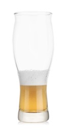 Almost empty glass of beer isolated on white