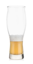 Almost empty glass of beer isolated on white