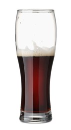 Photo of Half full glass of beer isolated on white