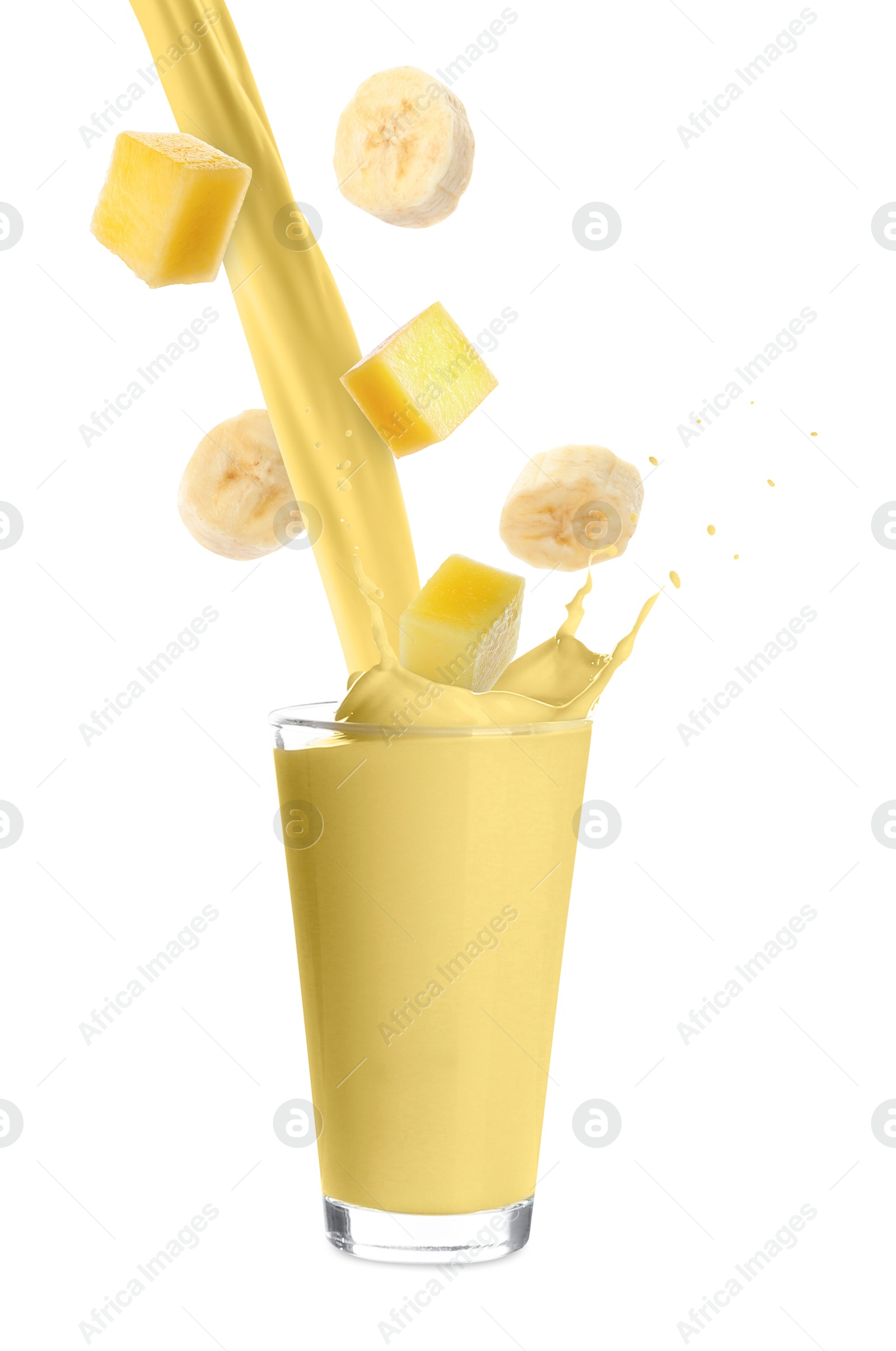 Image of Mango banana milkshake and pieces of fresh fruits on white background