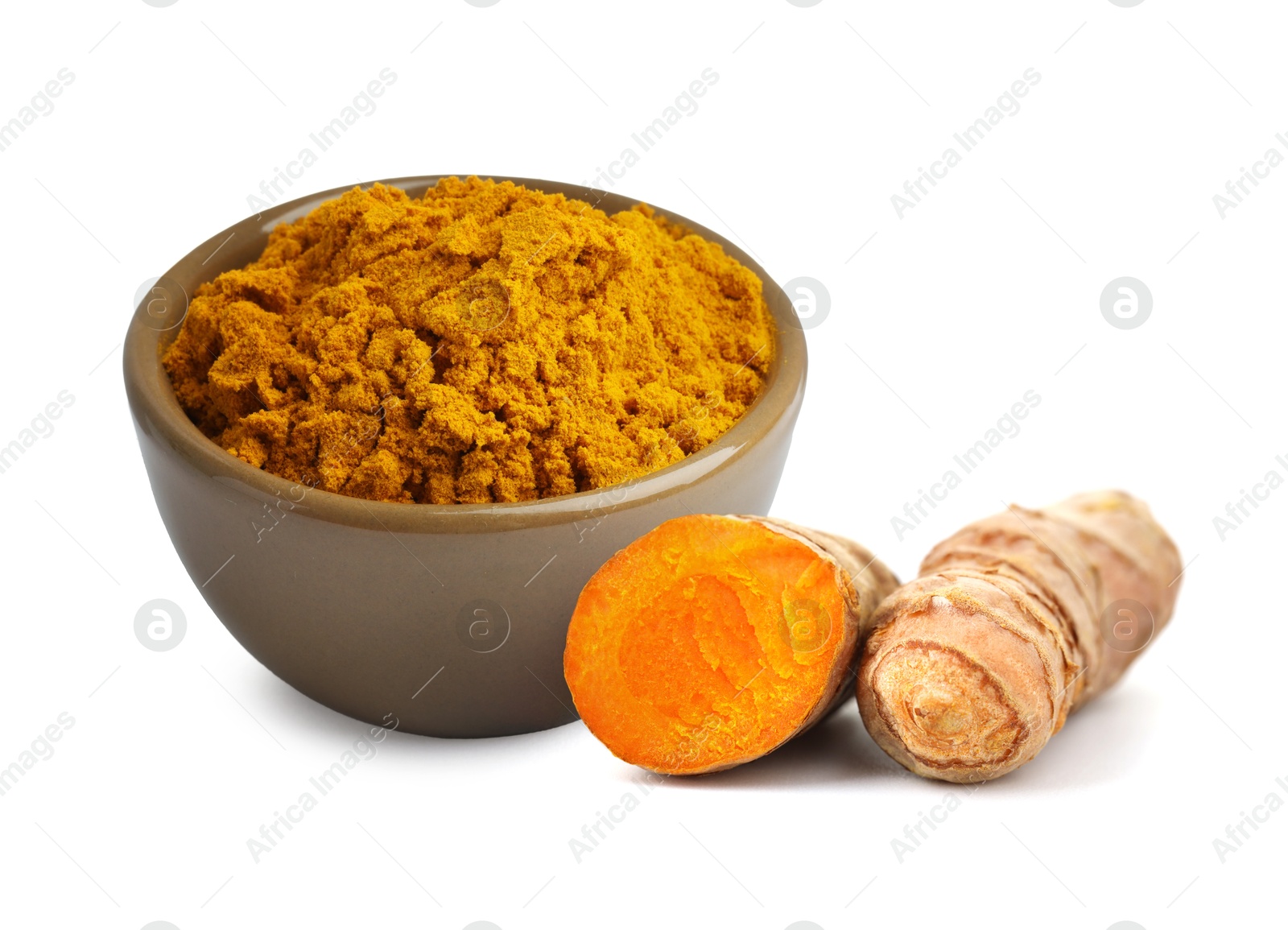 Image of Turmeric powder in bowl and fresh root isolated on white