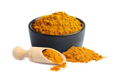 Image of Turmeric powder isolated on white. Aromatic spice