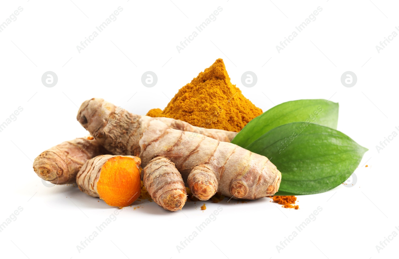 Image of Turmeric powder, fresh root and green leaves isolated on white