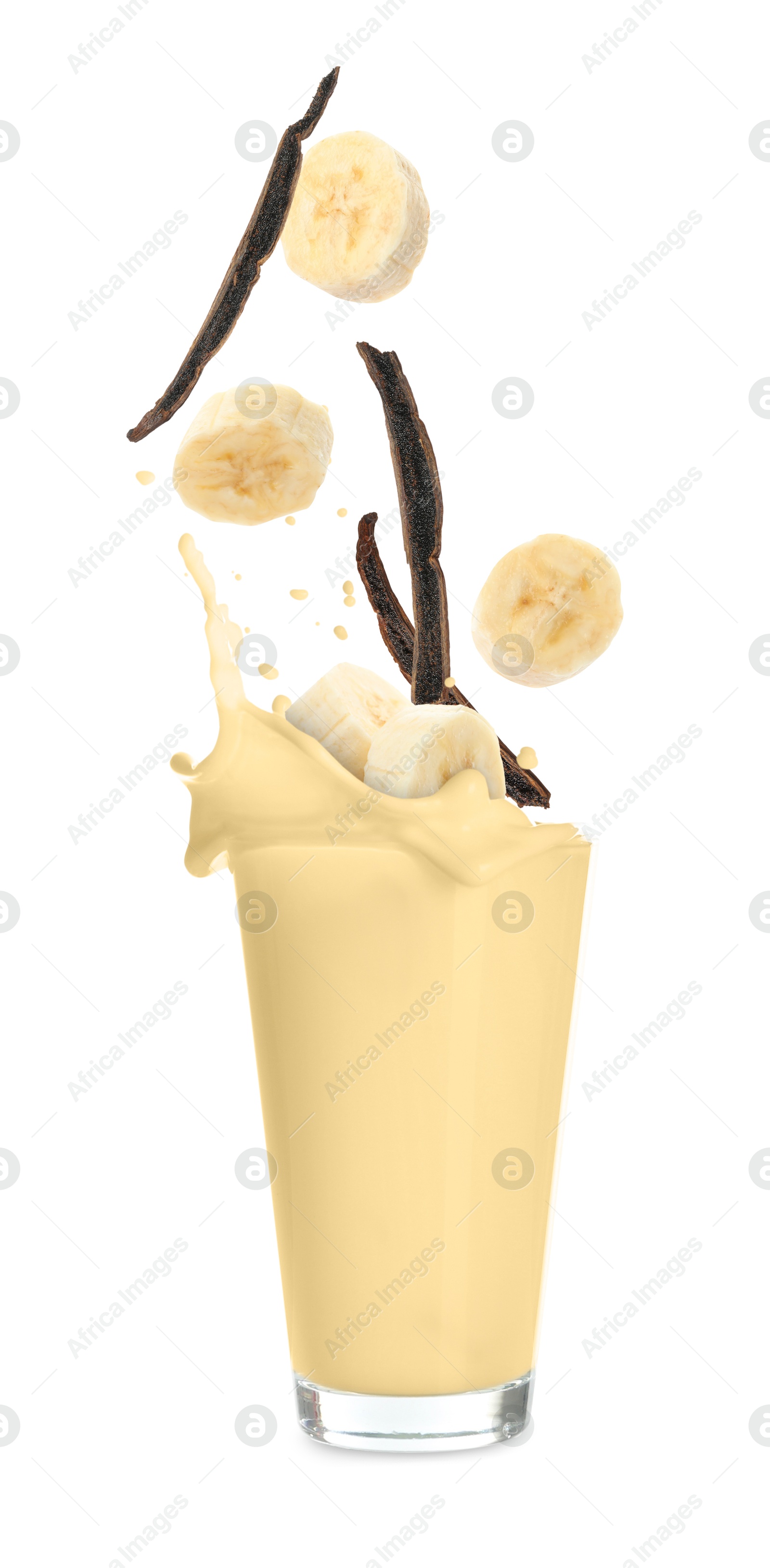 Image of Banana vanilla milkshake, pods and pieces of fresh fruit on white background