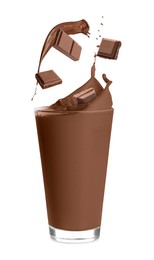 Yummy milkshake and pieces of chocolate on white background