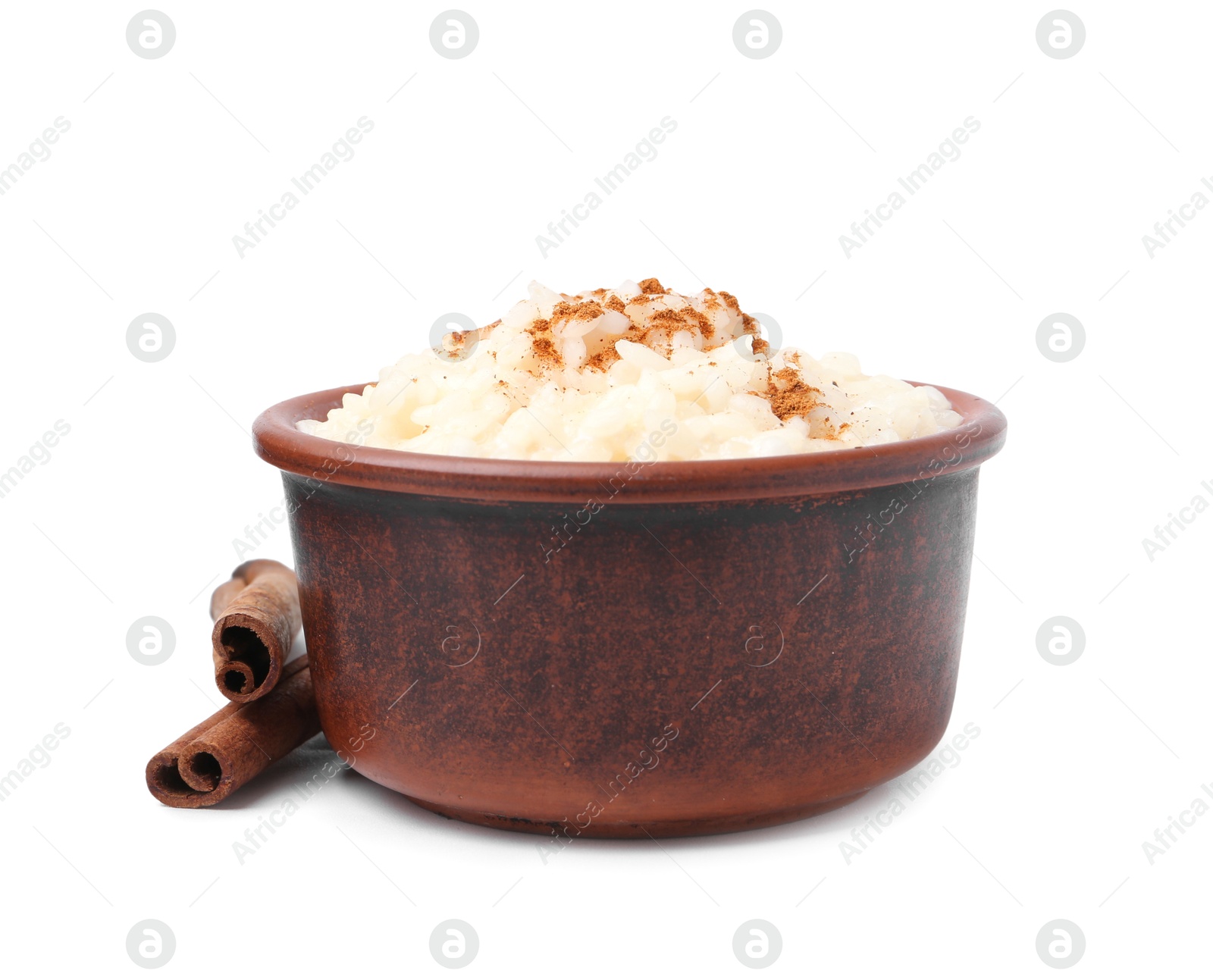 Photo of Tasty rice pudding with cinnamon isolated on white