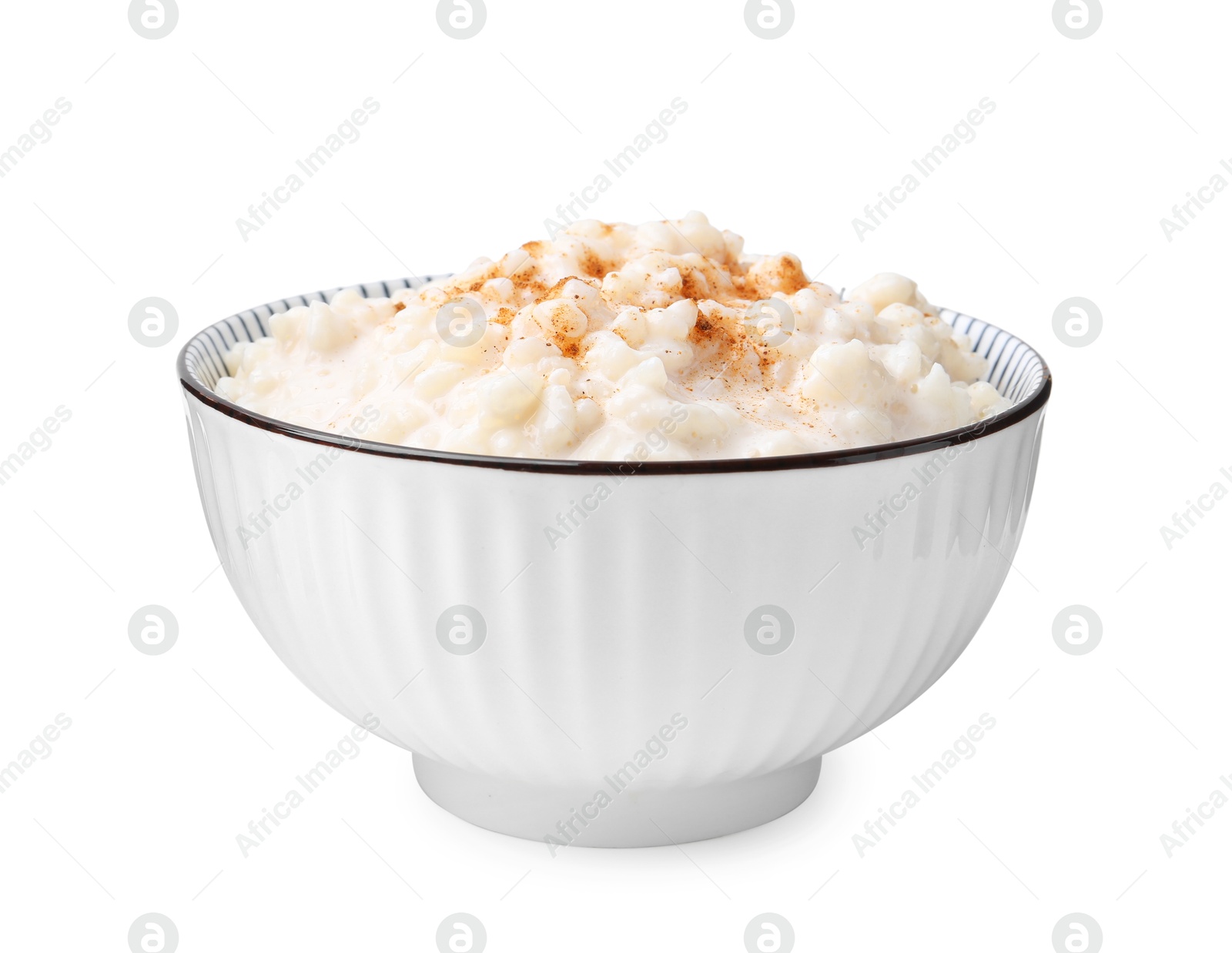 Photo of Tasty rice pudding with cinnamon isolated on white