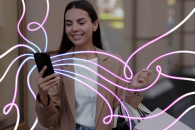 Image of Happy woman using mobile phone outdoors. Bright lines coming out of device symbolizing high speed internet