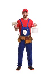 Photo of Professional painter with brush and bucket of paint on white background