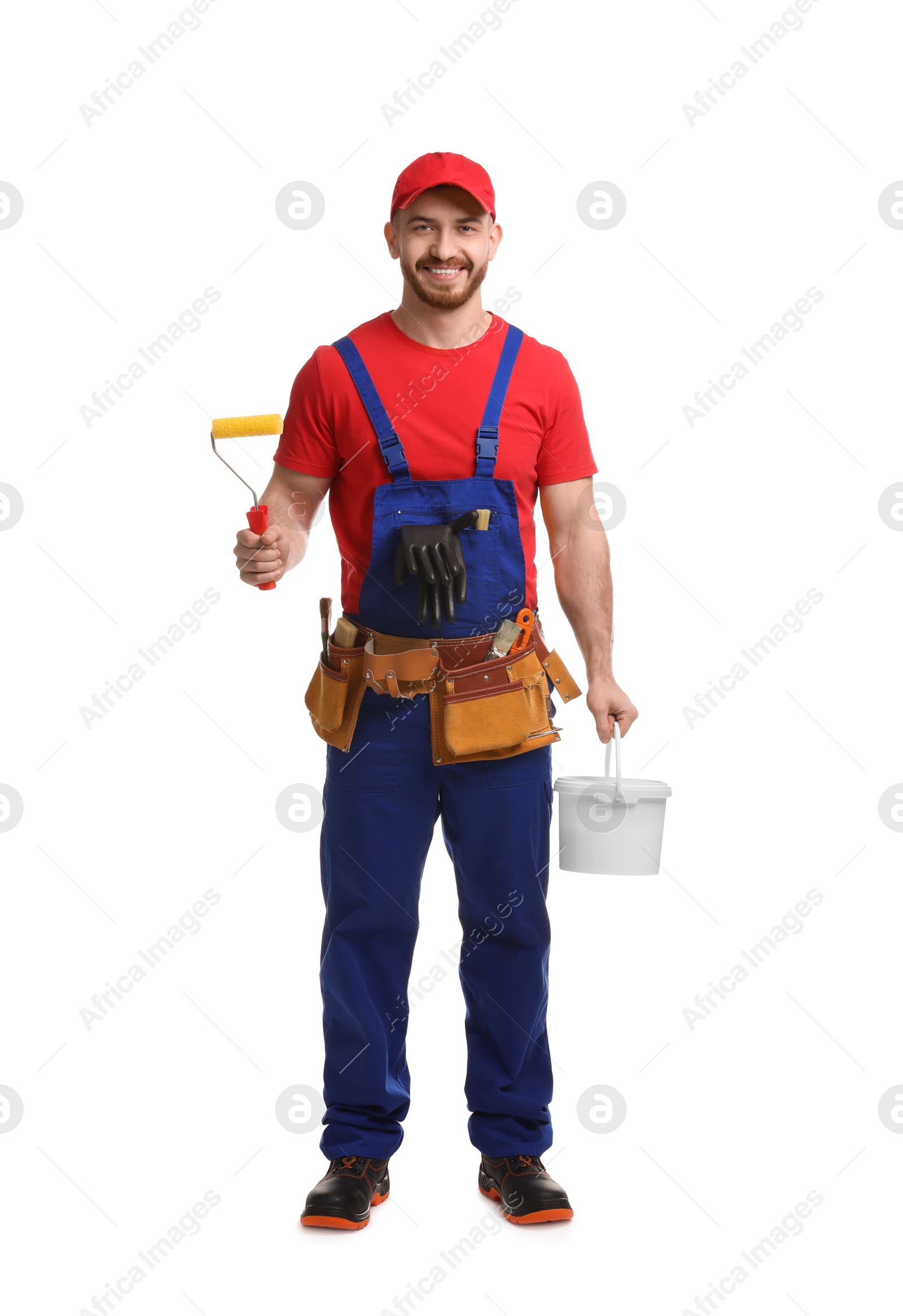 Photo of Professional painter with roller and bucket of paint on white background