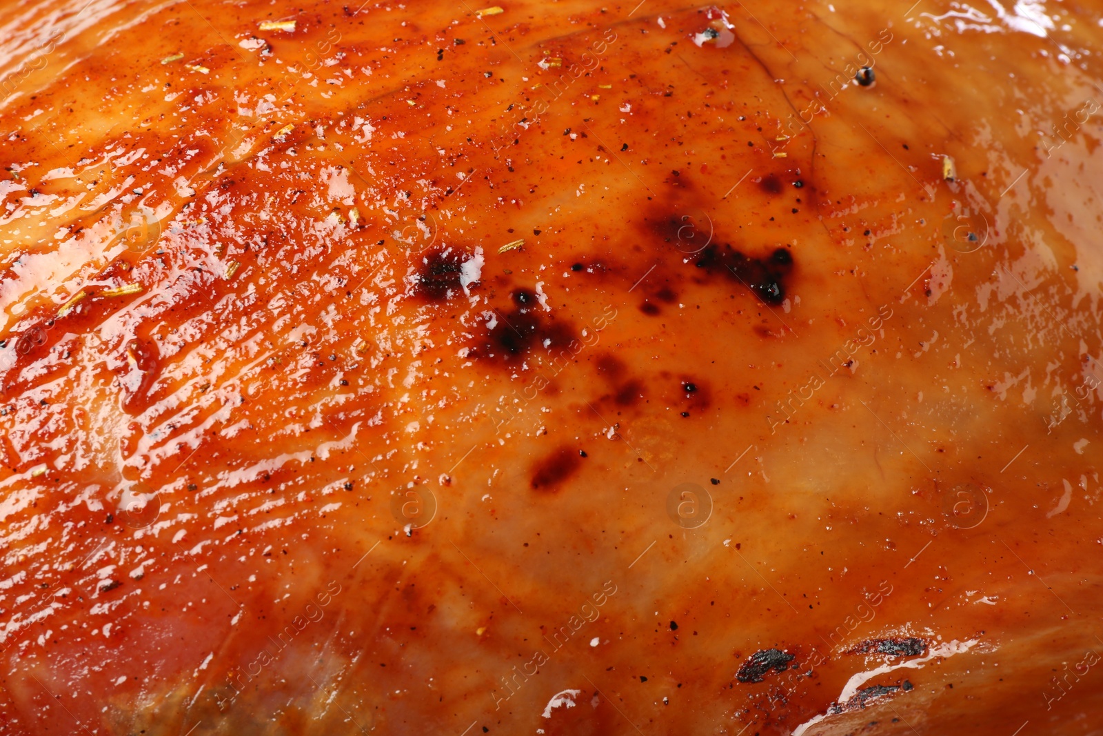 Photo of Delicious freshly baked turkey as background, closeup