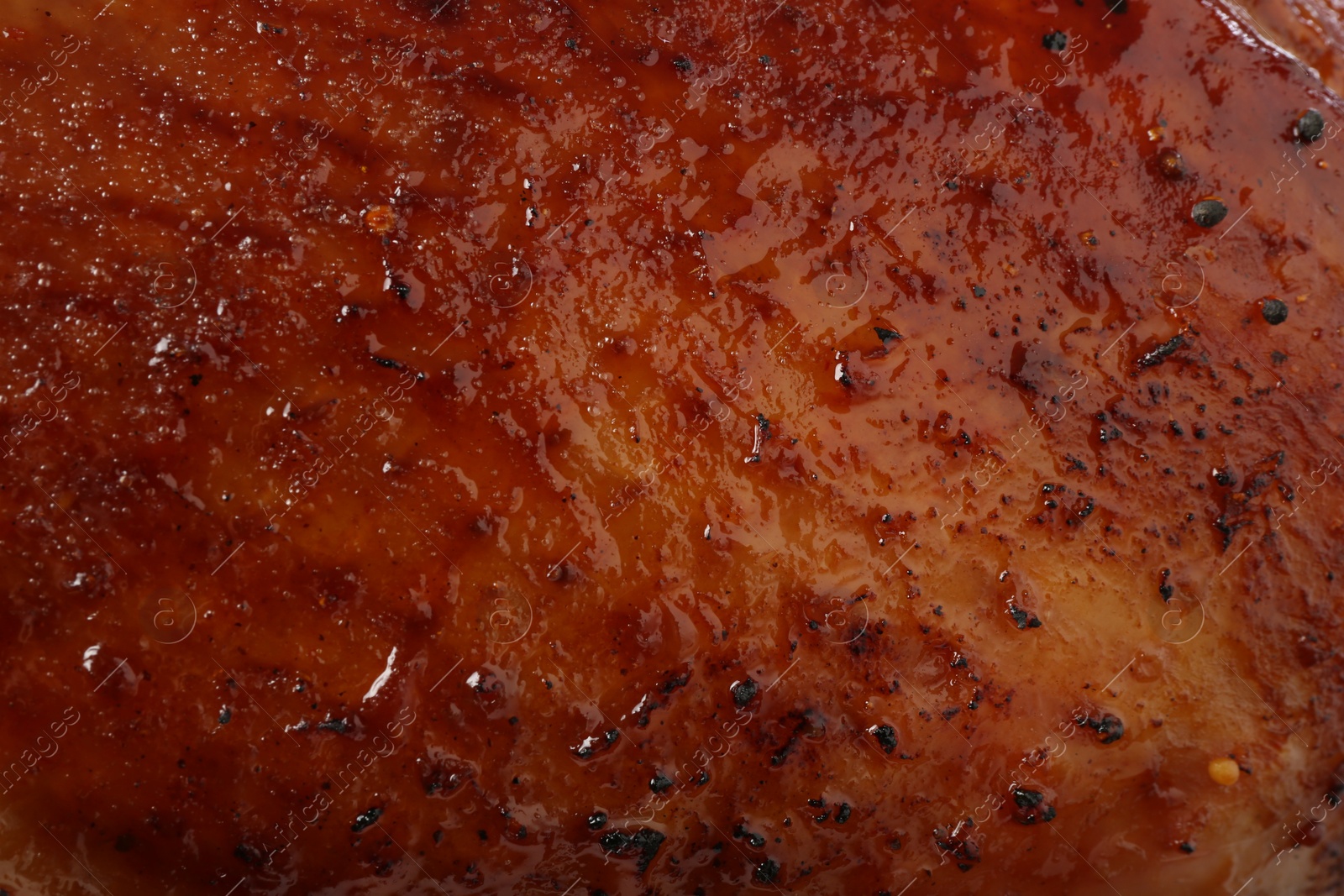 Photo of Delicious freshly baked turkey as background, closeup