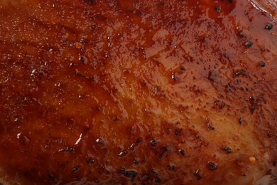 Photo of Delicious freshly baked turkey as background, closeup