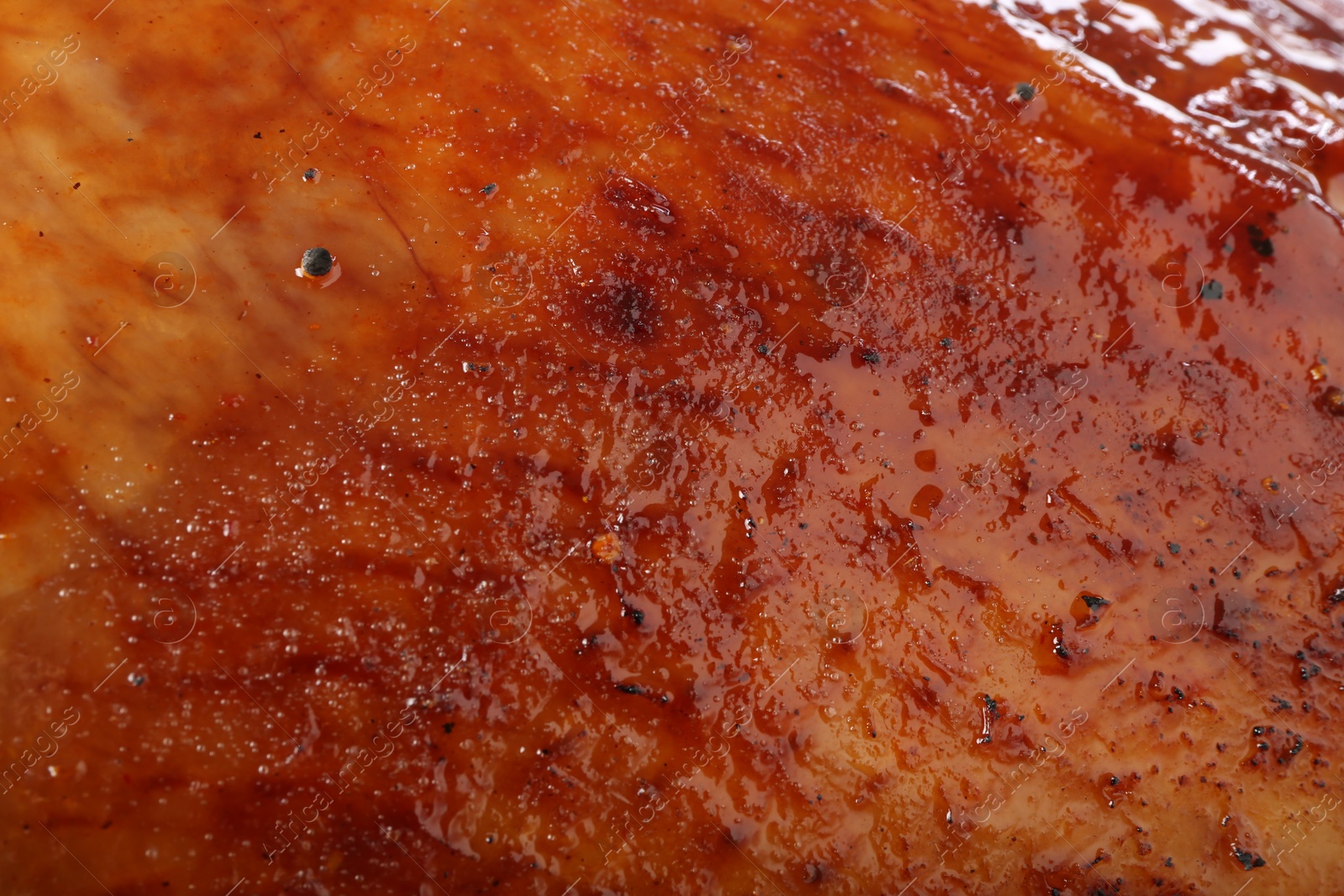 Photo of Delicious freshly baked turkey as background, closeup