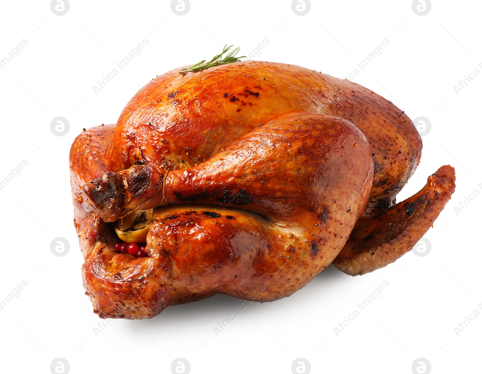 Photo of Whole baked turkey with rosemary isolated on white