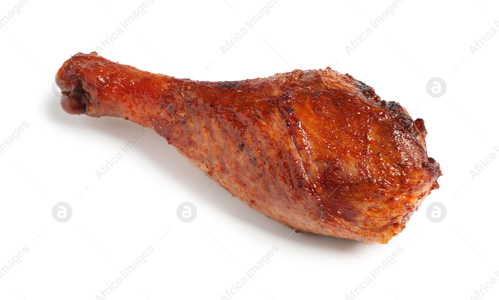 Photo of Delicious baked turkey drumstick isolated on white