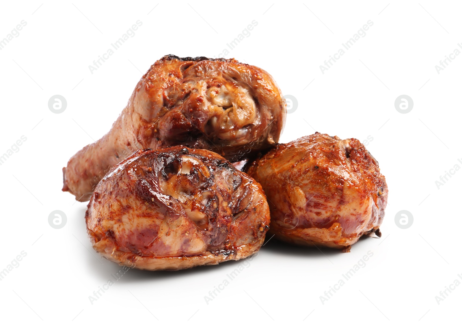 Photo of Delicious baked turkey drumsticks isolated on white