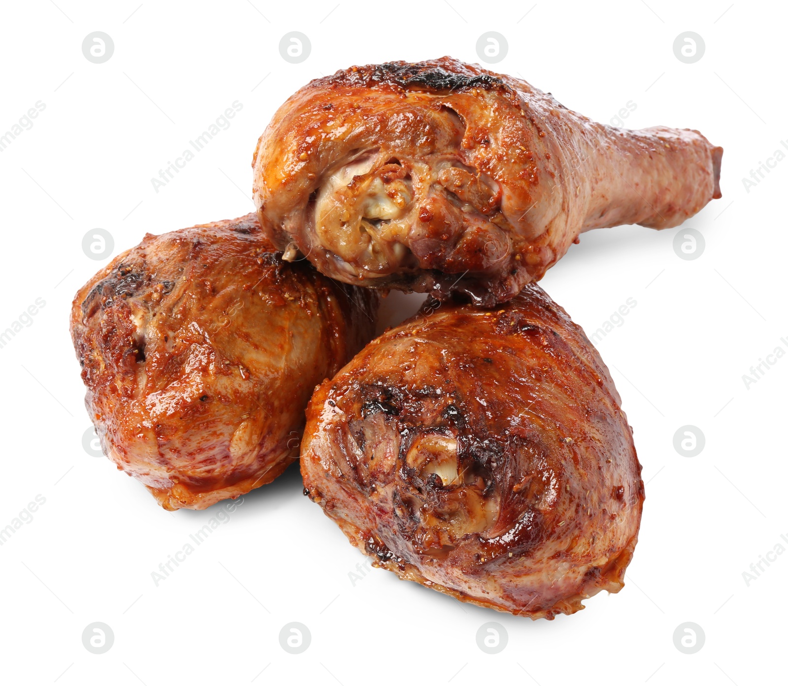 Photo of Delicious baked turkey drumsticks isolated on white