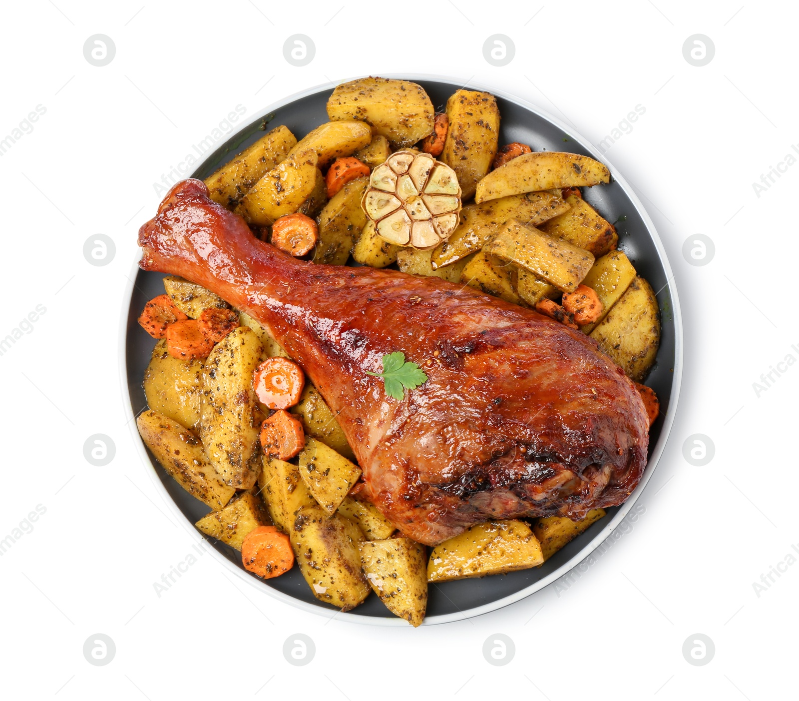 Photo of Baked turkey drumstick and vegetables isolated on white, top view