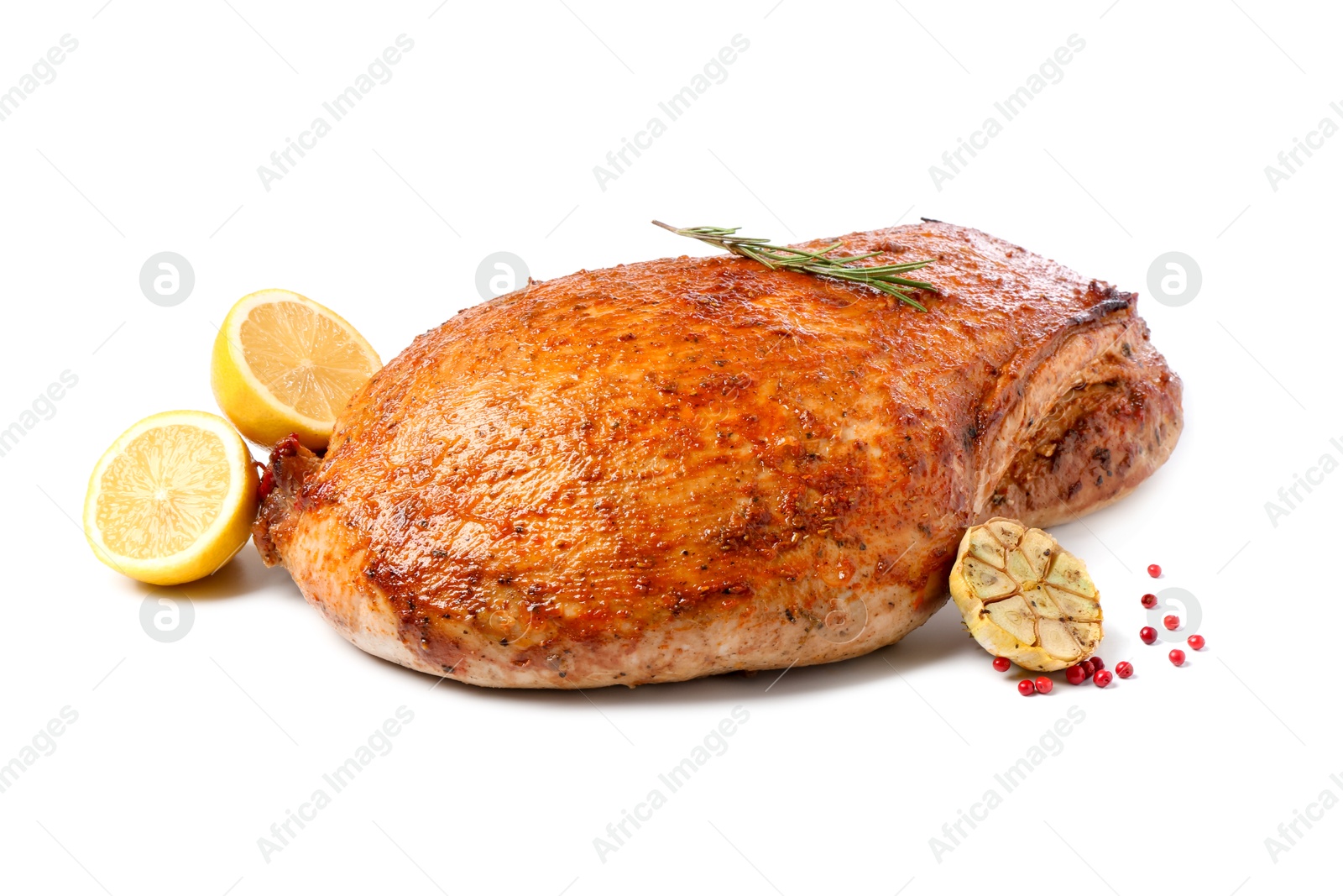 Photo of Piece of delicious baked turkey with lemon slices and spices isolated on white