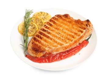 Photo of Delicious grilled turkey breast with lemon slices, chili pepper and rosemary isolated on white