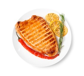 Photo of Delicious grilled turkey breast with lemon slices, chili pepper and rosemary isolated on white, top view