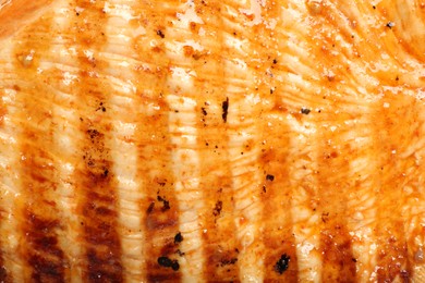 Photo of Delicious grilled turkey breast as background, closeup