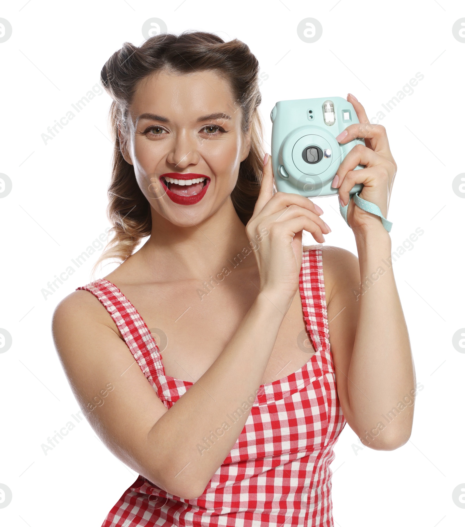 Photo of Happy pin-up woman with camera on white background