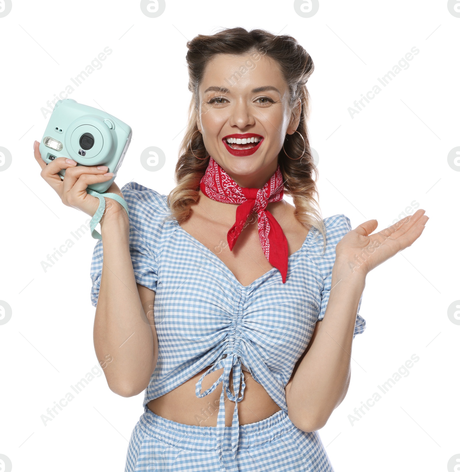 Photo of Happy pin-up woman with camera on white background