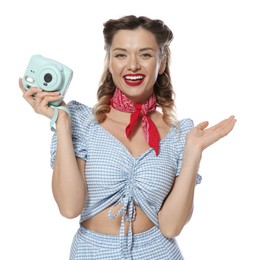 Photo of Happy pin-up woman with camera on white background