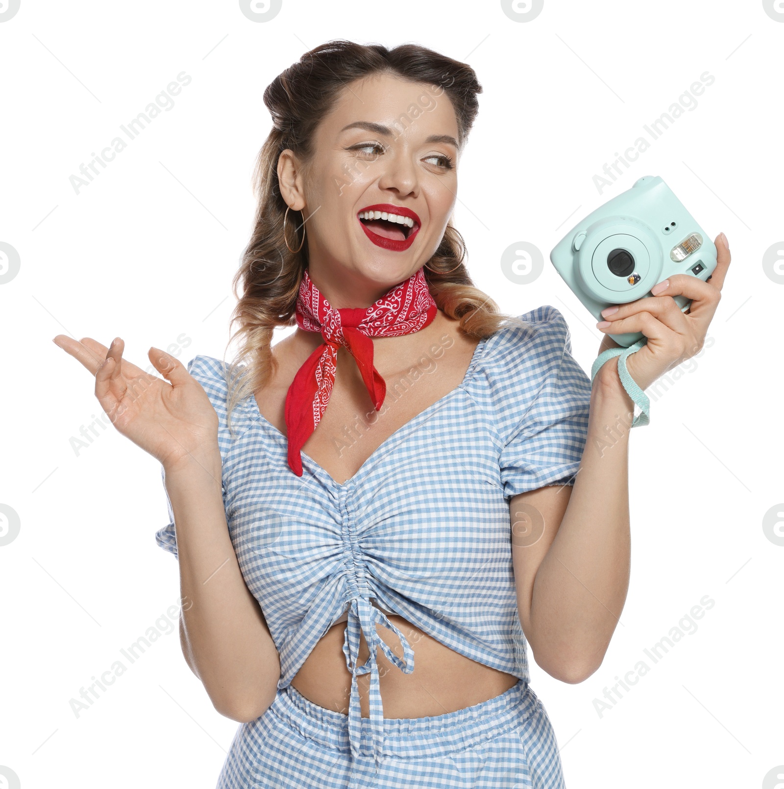 Photo of Happy pin-up woman with camera on white background