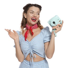 Photo of Happy pin-up woman with camera on white background