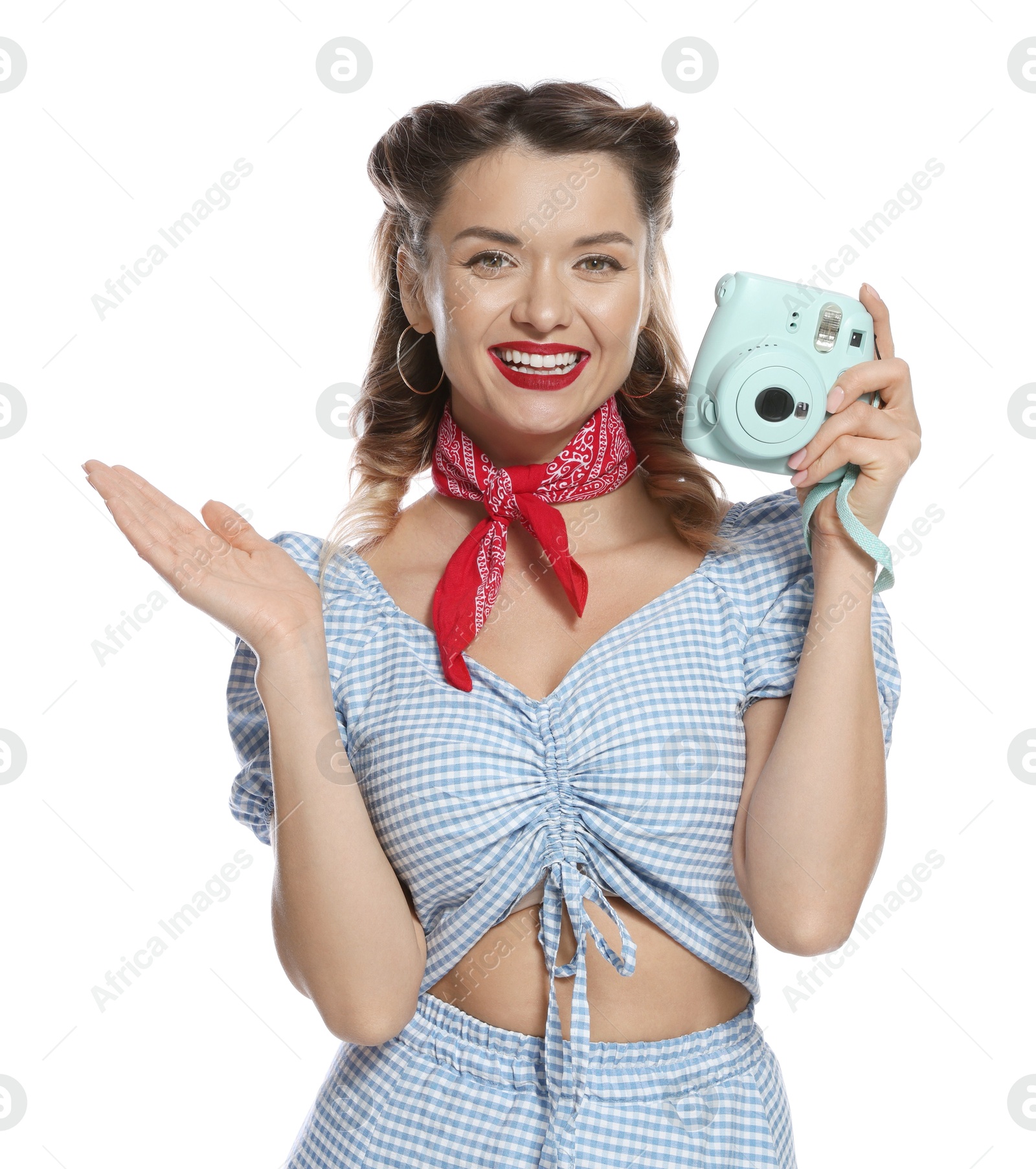 Photo of Happy pin-up woman with camera on white background