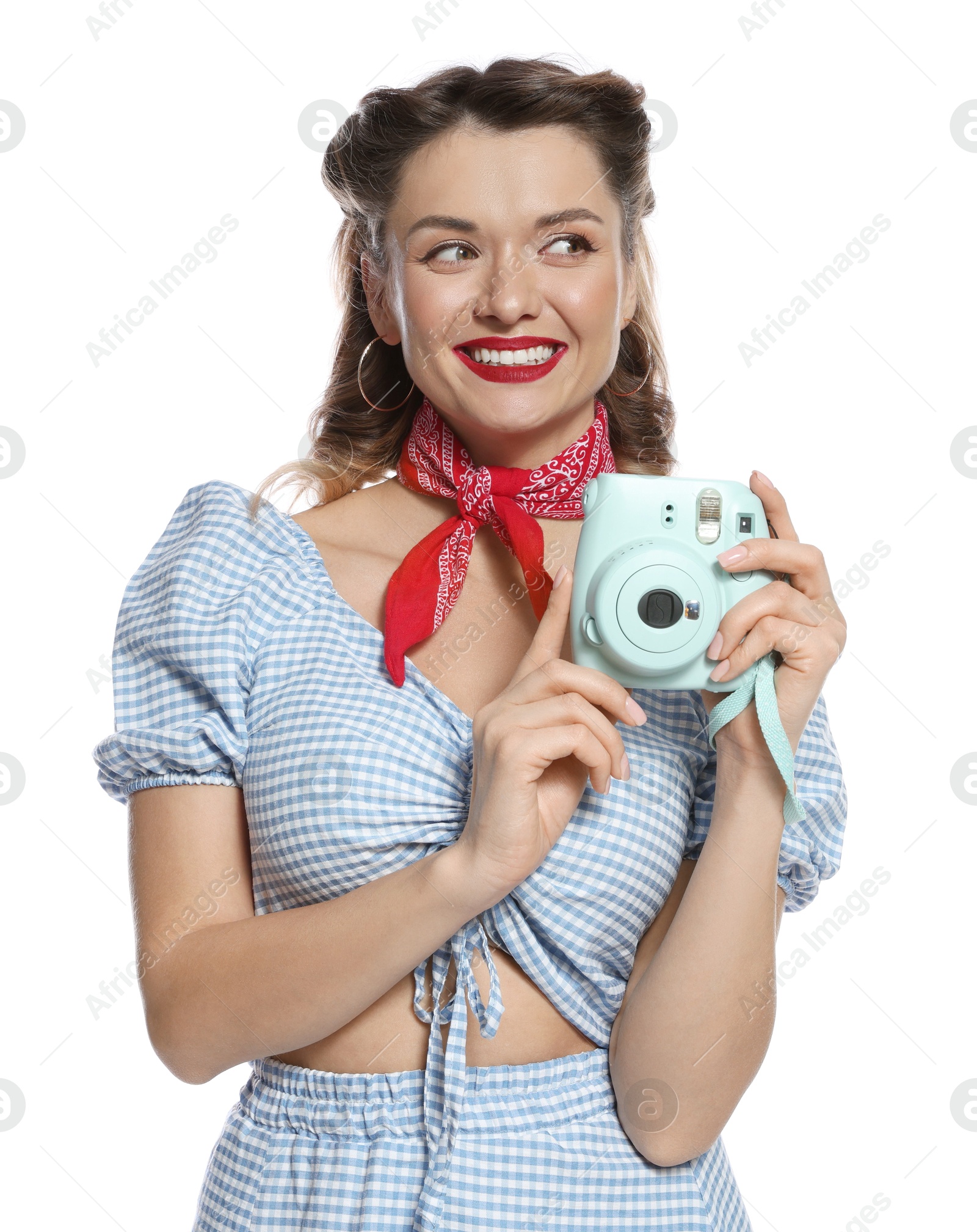 Photo of Happy pin-up woman with camera on white background