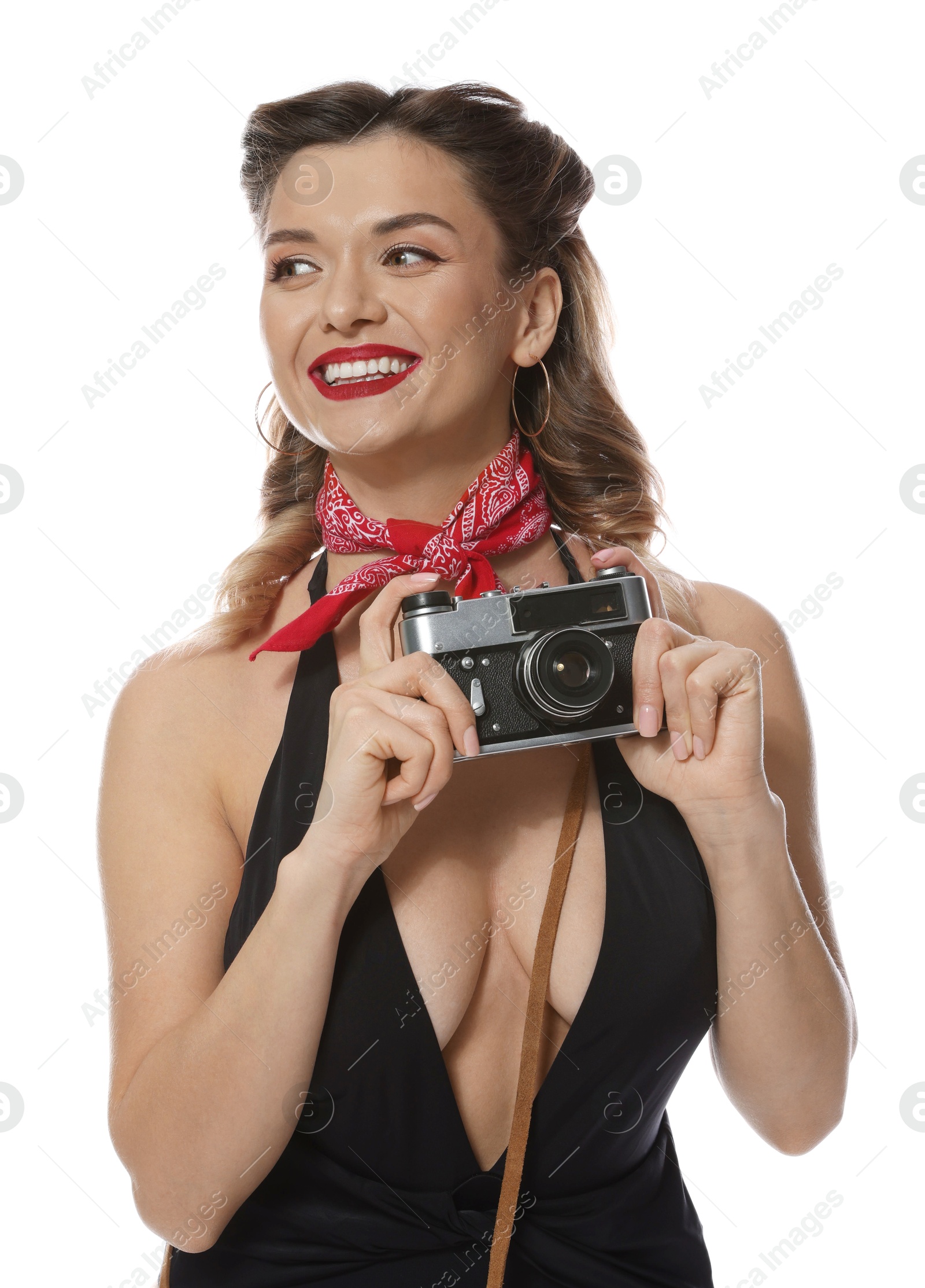 Photo of Happy pin-up woman with vintage camera on white background