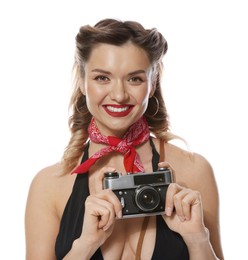 Photo of Happy pin-up woman with vintage camera on white background