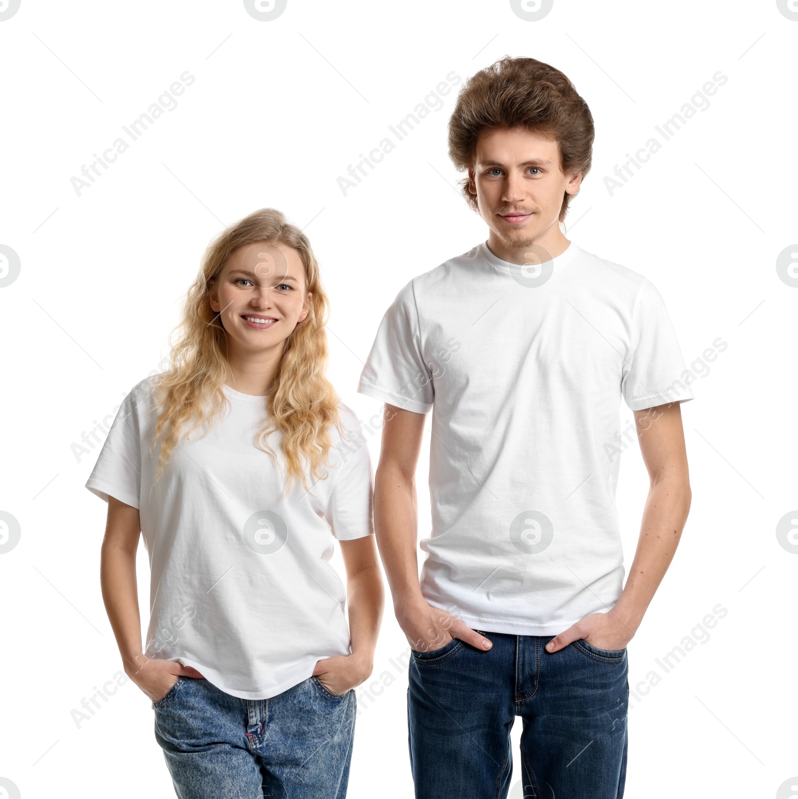 Photo of Young woman and man wearing blank t-shirts on white background. Mockup for design