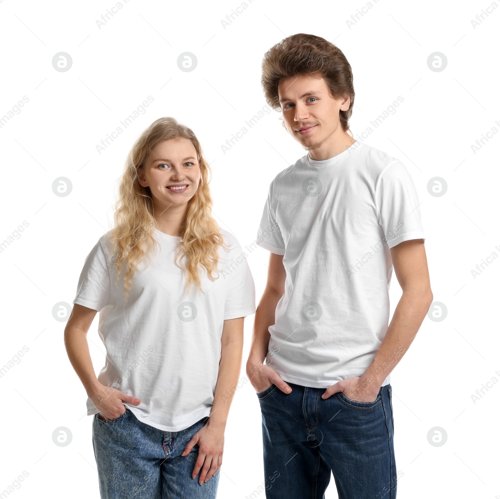 Photo of Young woman and man wearing blank t-shirts on white background. Mockup for design