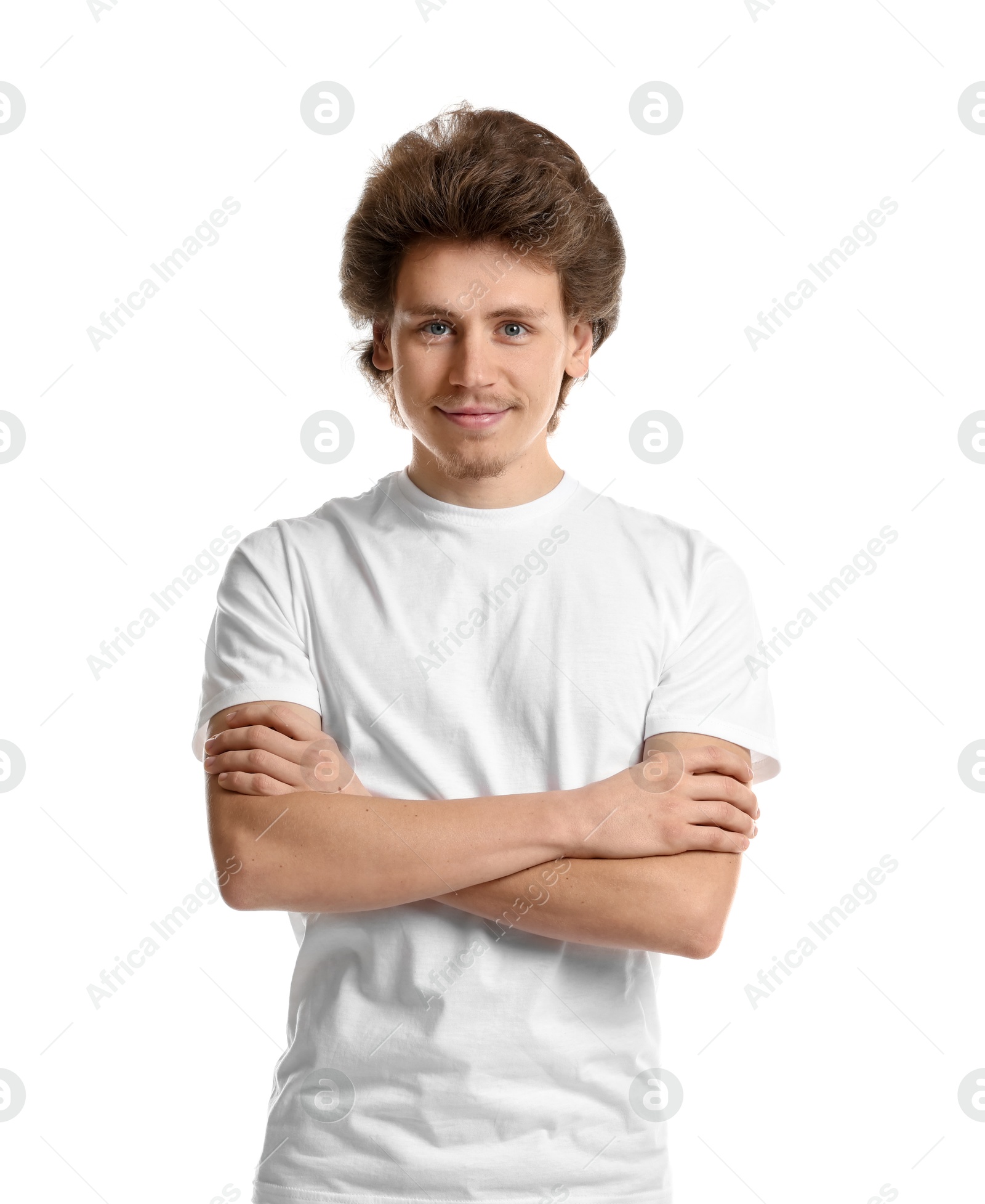 Photo of Young man wearing blank t-shirt on white background. Mockup for design