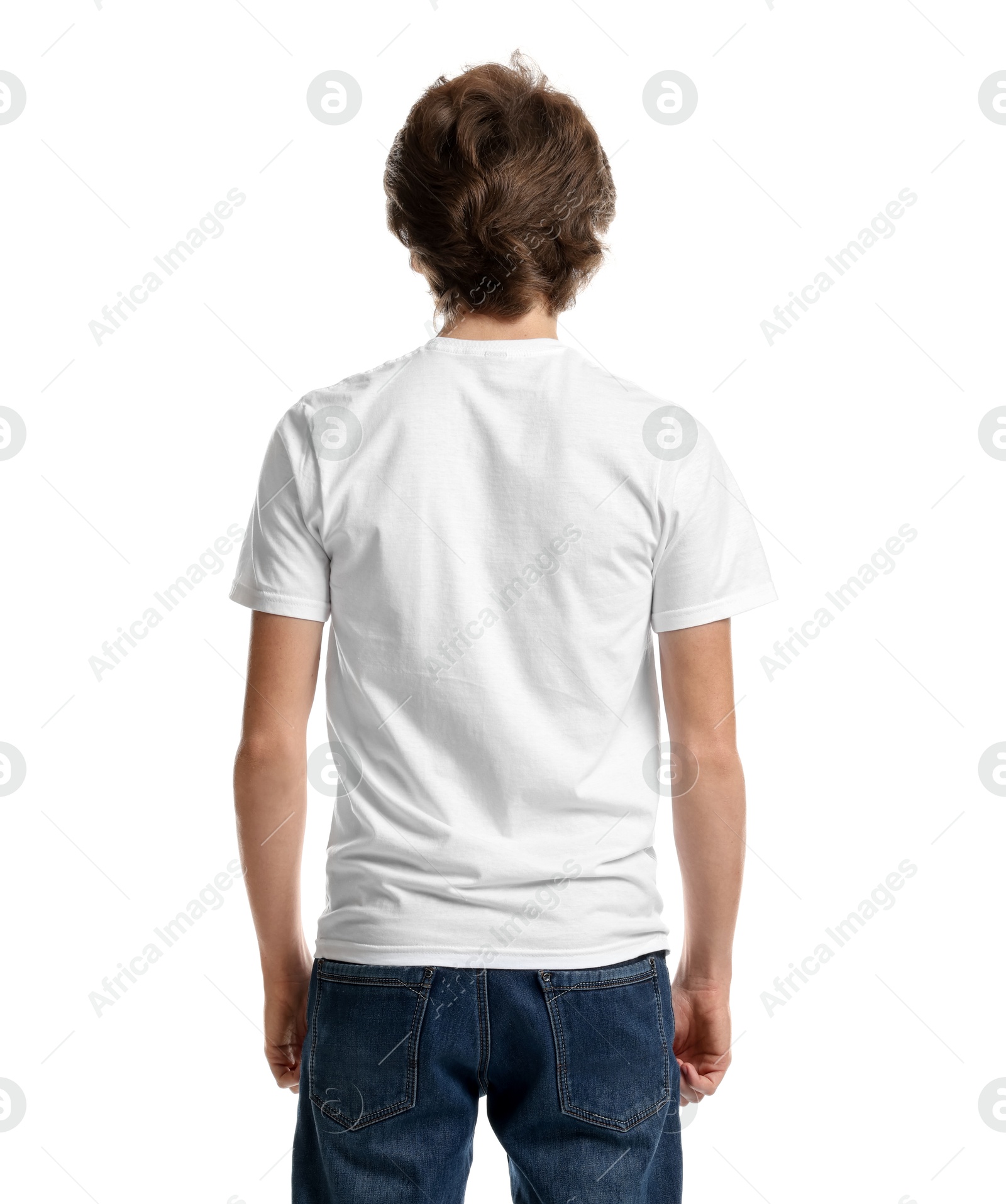 Photo of Young man wearing blank t-shirt on white background, back view. Mockup for design