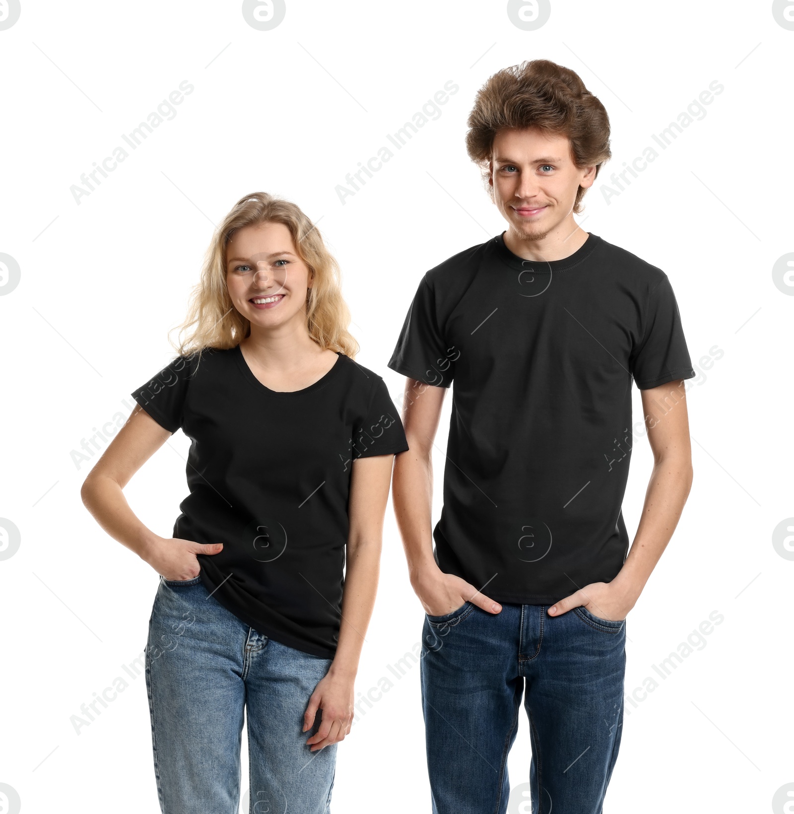 Photo of Young woman and man wearing blank black t-shirts on white background. Mockup for design