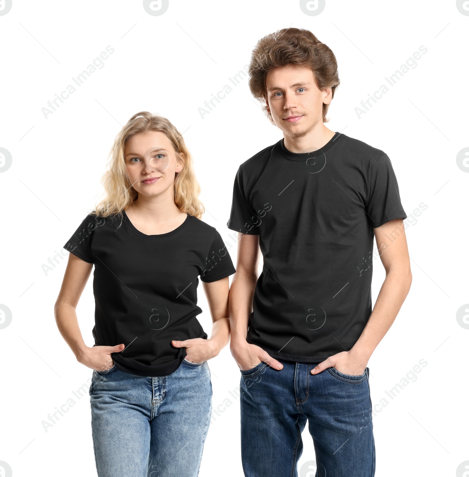 Photo of Young woman and man wearing blank black t-shirts on white background. Mockup for design