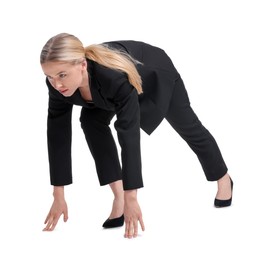 Businesswoman in starting position for run ready for competition on white background