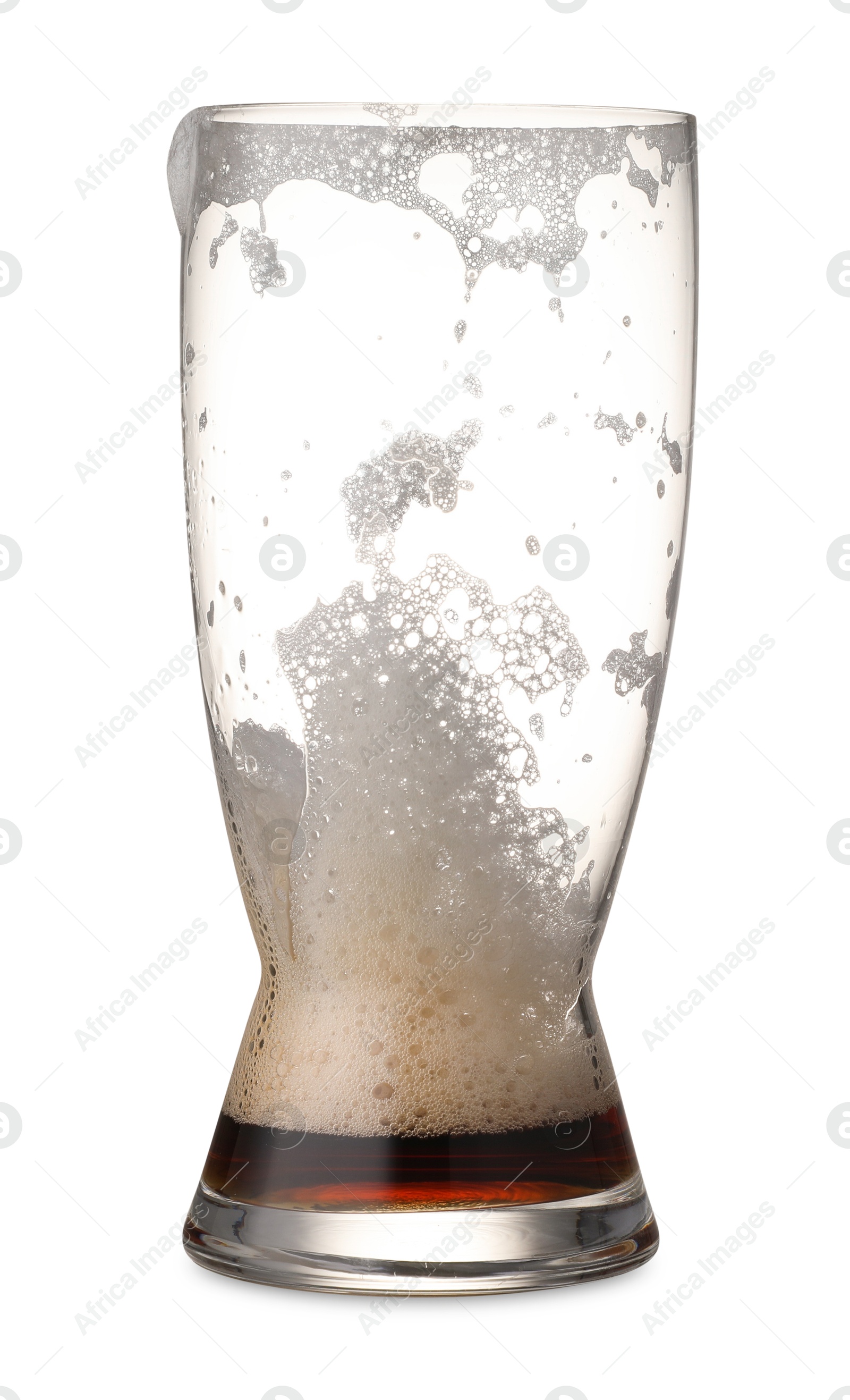 Photo of Almost empty glass of beer isolated on white