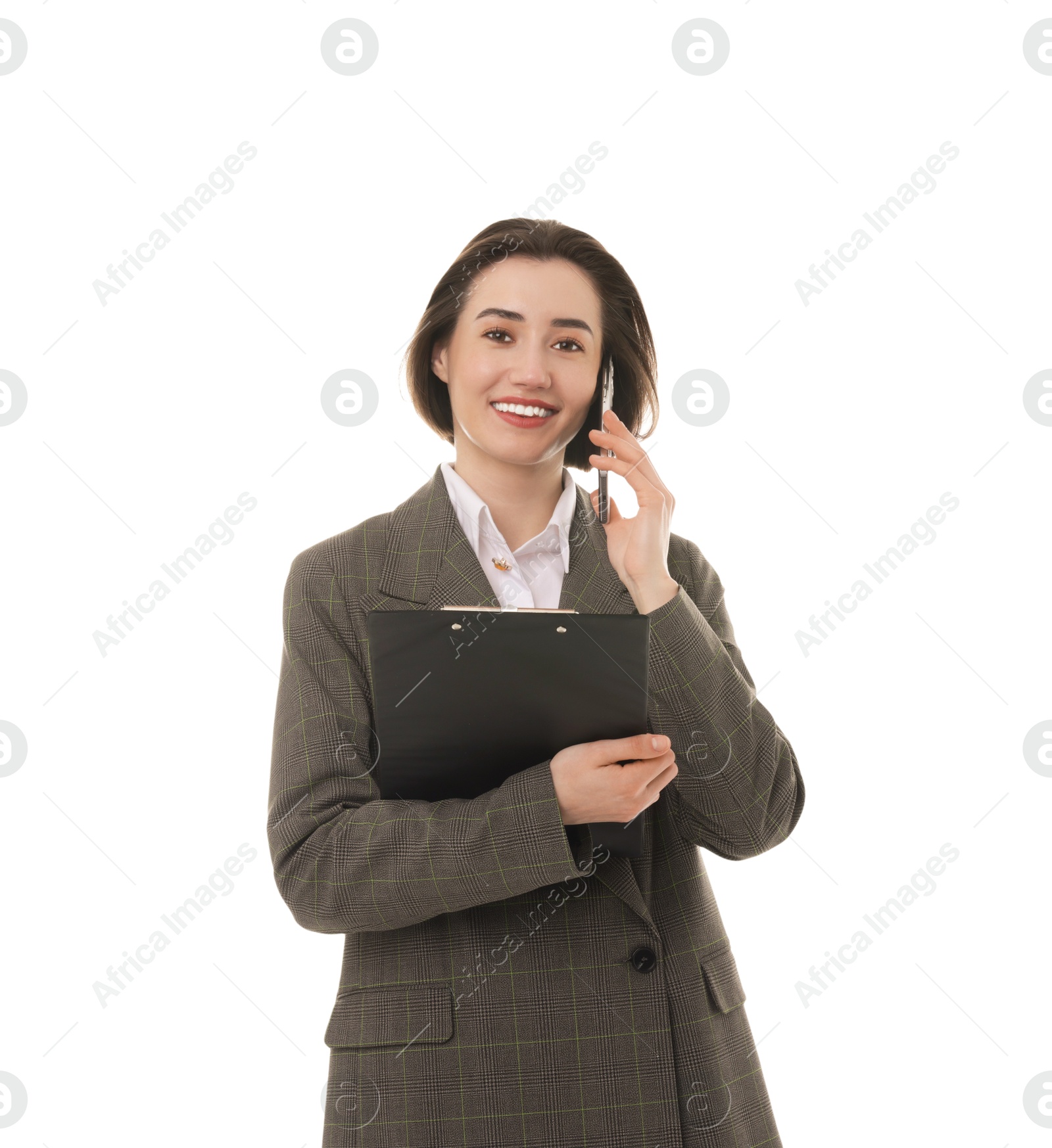 Photo of Smiling secretary with clipboard talking on smartphone against white background