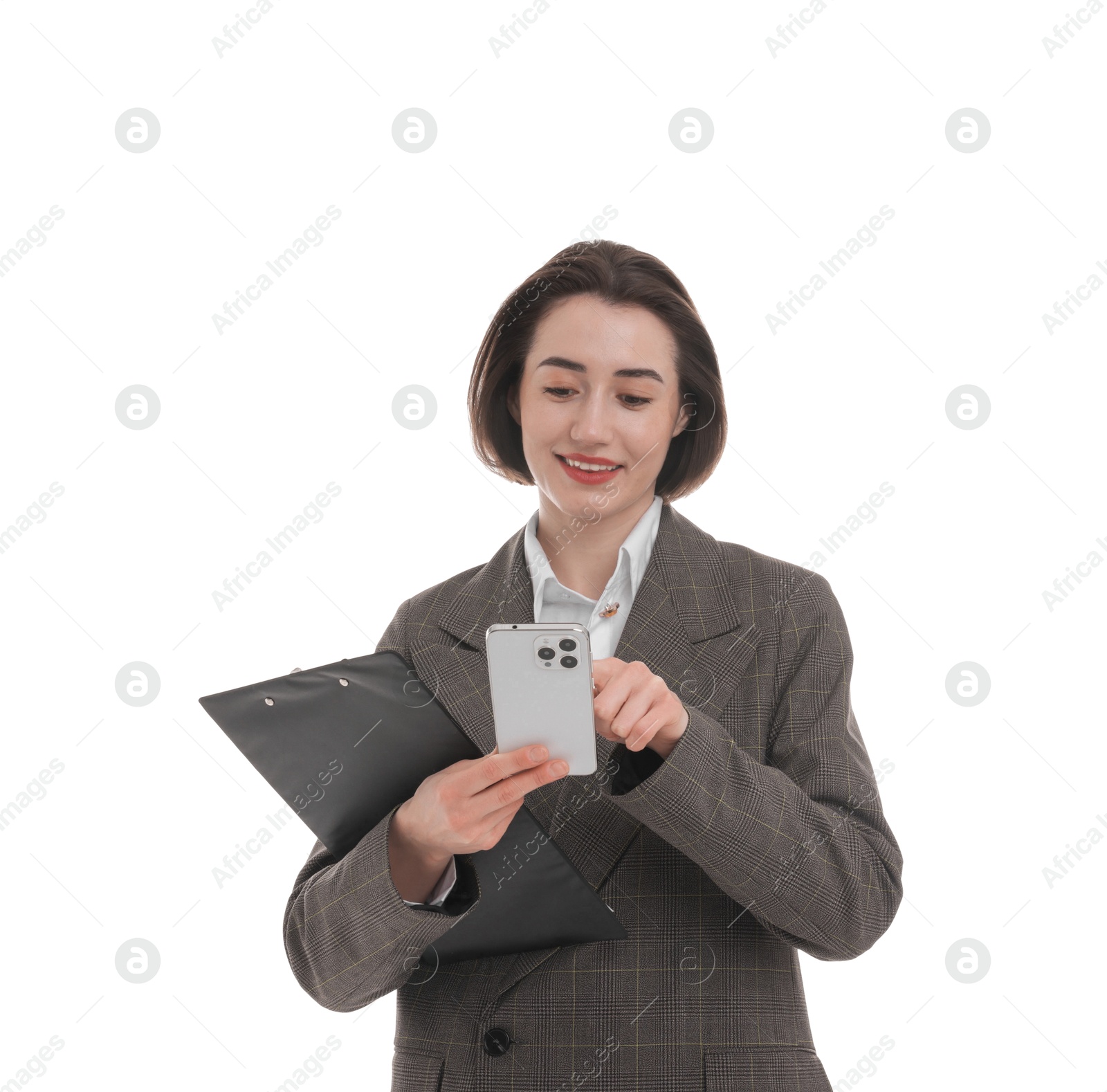 Photo of Smiling secretary with clipboard using smartphone on white background