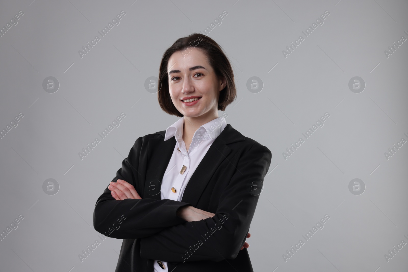 Photo of Portrait of confident secretary on grey background