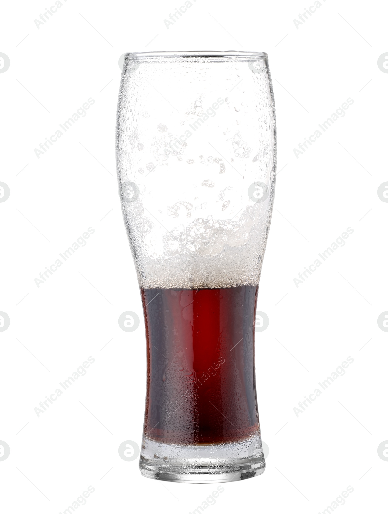 Photo of Half full glass of beer isolated on white